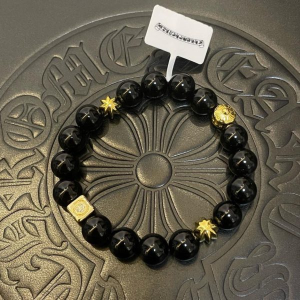 Bracciale croce multi-elemento Chrome Hearts con onice nero e oro