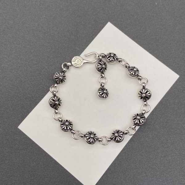 Bracciale con fiore incrociato con cuori cromati