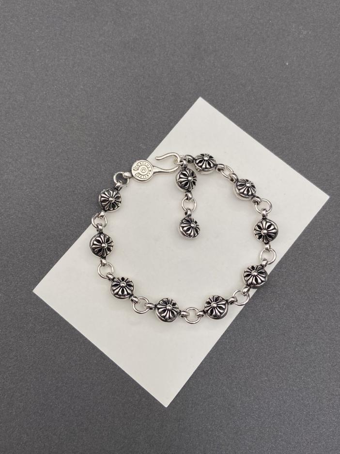 replica,repliche,fake,1:1,earrings,bracelet,ring,jewelry Bracciale con fiore incrociato con cuori cromati replica,repliche,fake,1:1,earrings,bracelet,ring,jewelry Bracciale con fiore incrociato con cuori cromati