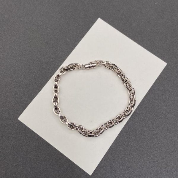 replica,repliche,fake,1:1,earrings,bracelet,ring,jewelry Bracciale con aragosta con lettera di cuori cromati