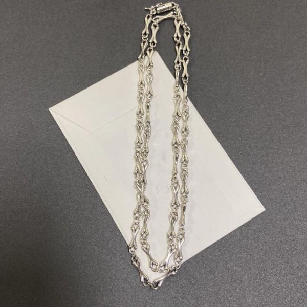 replica,repliche,fake,1:1,earrings,bracelet,ring,jewelry Collana con cuori cromati