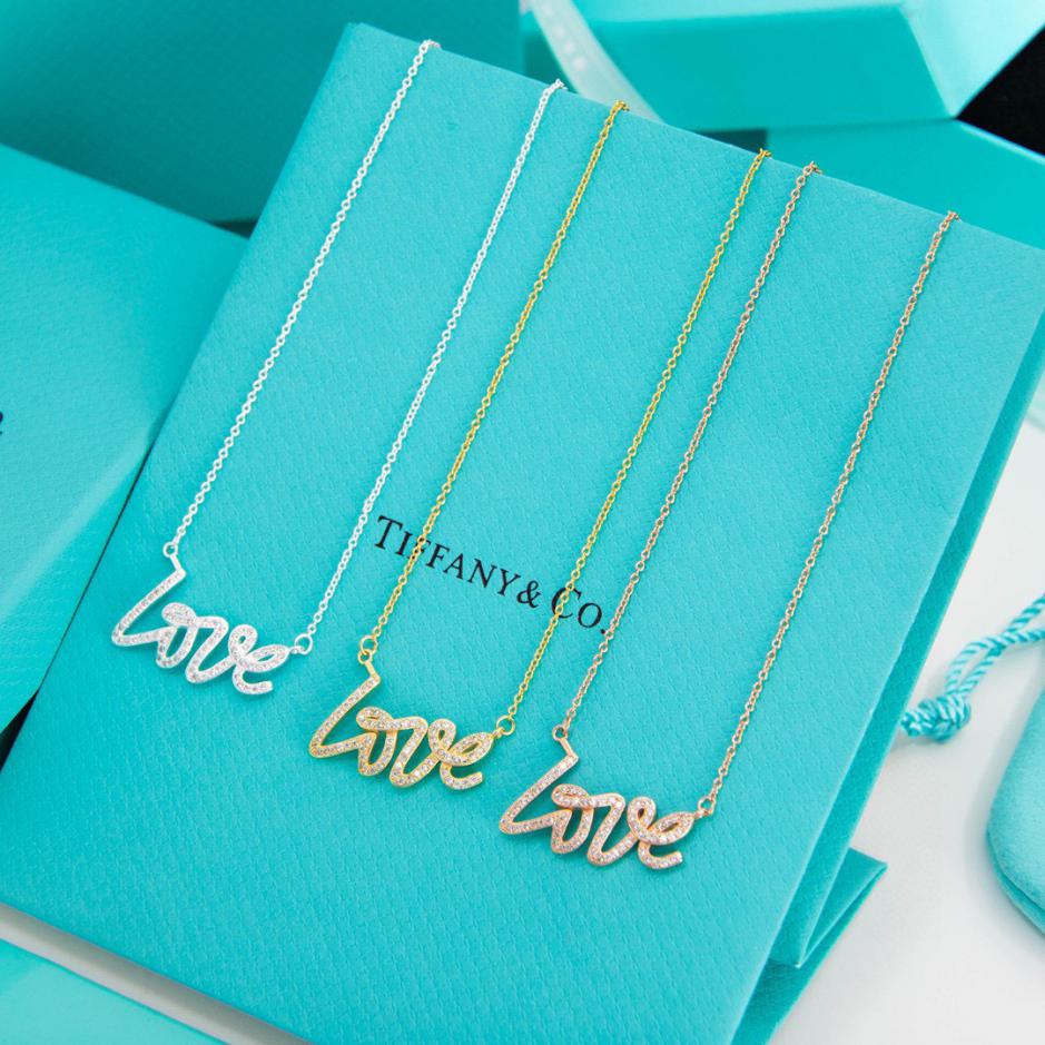 replica,repliche,fake,1:1,earrings,bracelet,ring,jewelry Collana Tiffany LOVE con catena clavicola piena di diamanti