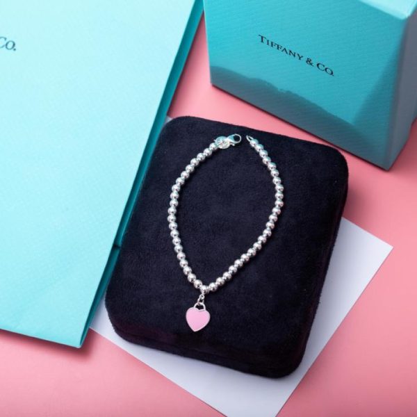 replica,repliche,fake,1:1,earrings,bracelet,ring,jewelry Bracciale Tiffany T con cuore rosa e perline