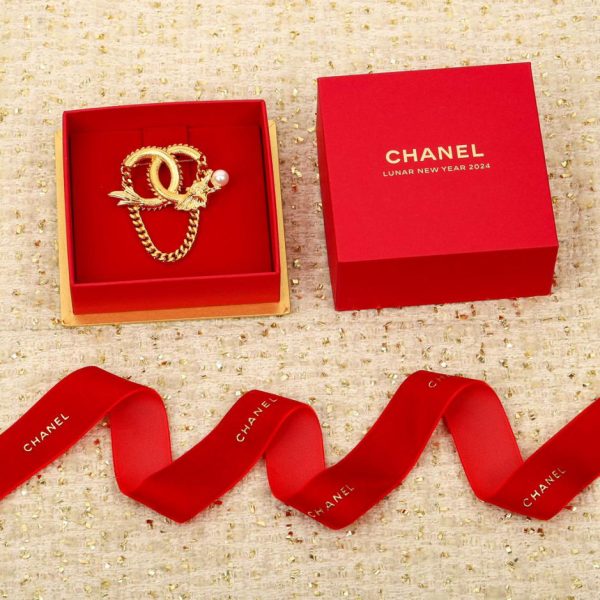 replica,repliche,fake,1:1,earrings,bracelet,ring,jewelry Spilla regalo Chanel