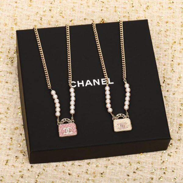 replica,repliche,fake,1:1,earrings,bracelet,ring,jewelry Collana con borsa Chanel