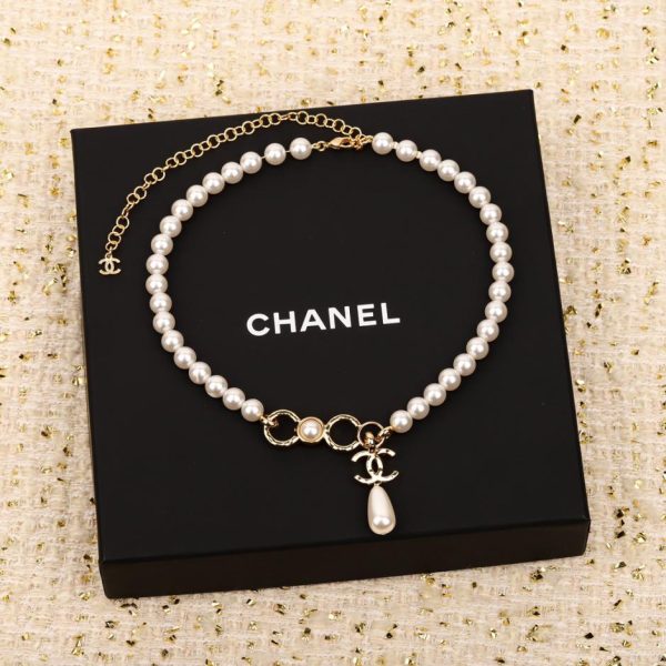 replica,repliche,fake,1:1,earrings,bracelet,ring,jewelry Collana Chanel mezza perla e mezza catena