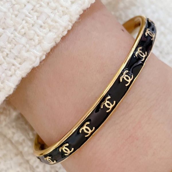 Bracciale aperto Chanel doppia C bianca e nera