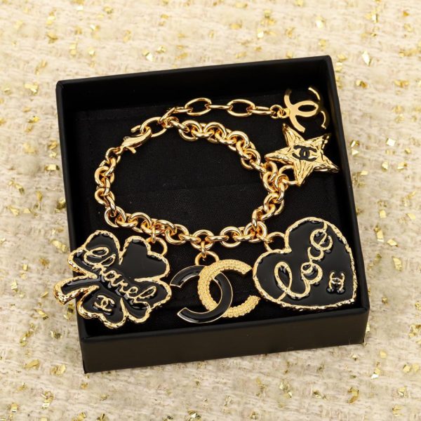 replica,repliche,fake,1:1,earrings,bracelet,ring,jewelry Bracciale multielemento Chanel in smalto nero