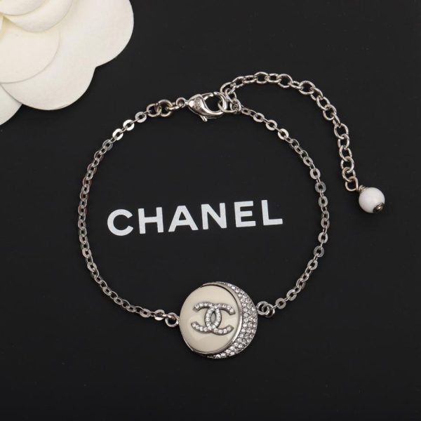replica,repliche,fake,1:1,earrings,bracelet,ring,jewelry Bracciale Chanel doppia C in resina bianca