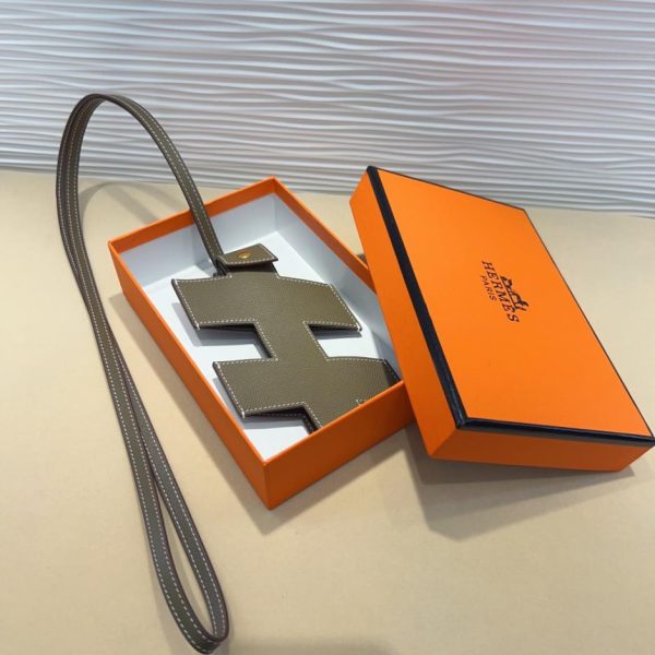 replica,repliche,fake,1:1,earrings,bracelet,ring,jewelry Borsa porta cellulare Hermès