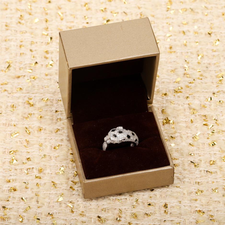 replica,repliche,fake,1:1,earrings,bracelet,ring,jewelry Anello Cartier con testa di leopardo bianco e nero con diamanti pieni replica,repliche,fake,1:1,earrings,bracelet,ring,jewelry Anello Cartier con testa di leopardo bianco e nero con diamanti pieni
