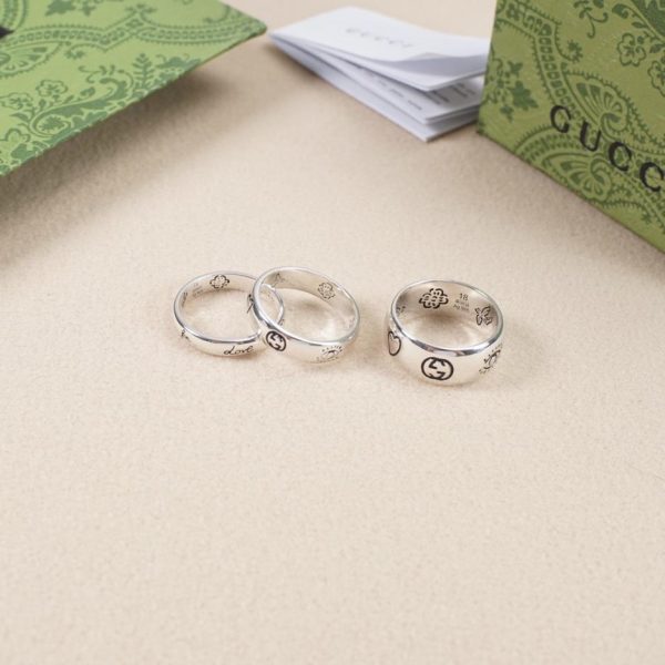 Anello Gucci con fiore e uccello