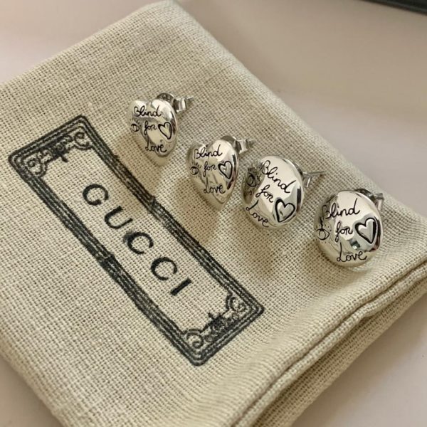 Anello Gucci con fiore e uccello