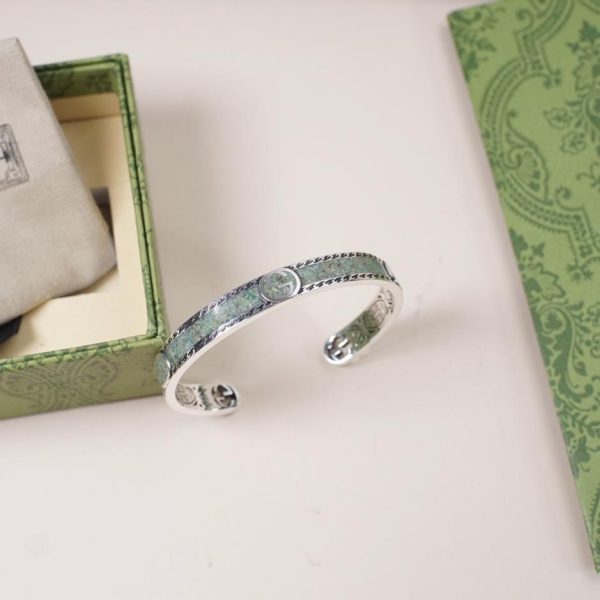 Bracciale Gucci intrecciato con doppia G smaltata