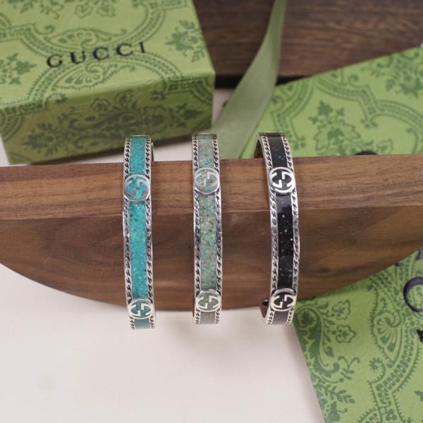 Bracciale Gucci intrecciato con doppia G smaltata