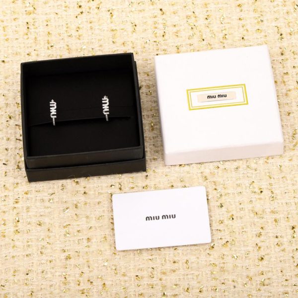 Orecchini Miu Miu con diamanti