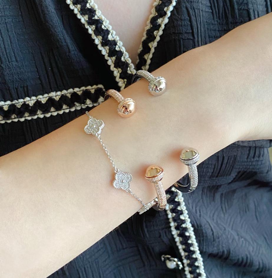 replica,repliche,fake,1:1,earrings,bracelet,ring,jewelry Bracciale Piaget con sfere rotanti piene di diamanti