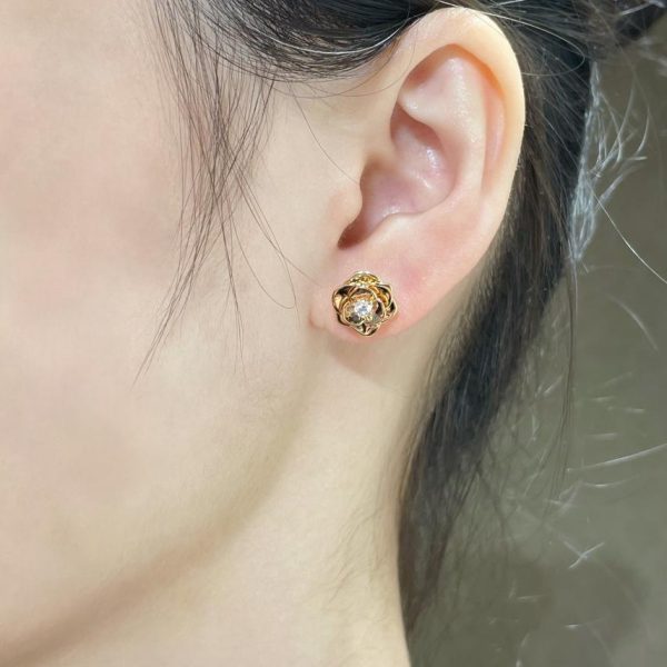 Orecchini Piaget a fiore pieno di diamanti