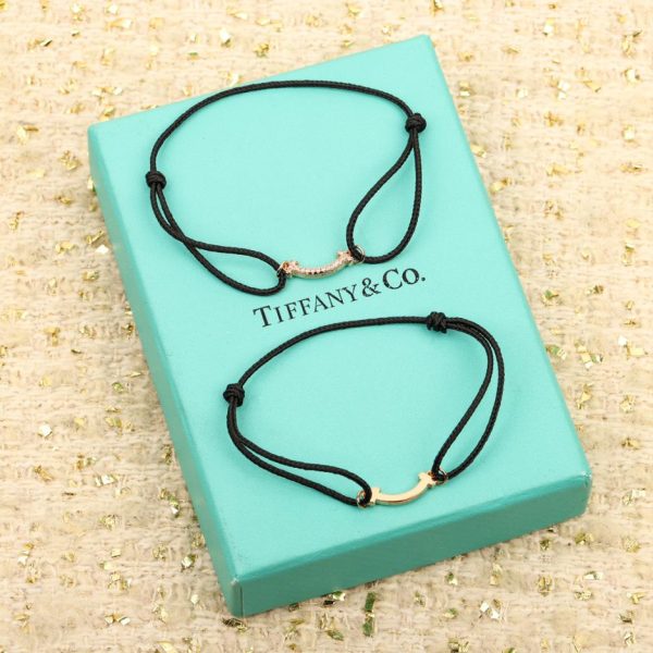 replica,repliche,fake,1:1,earrings,bracelet,ring,jewelry Collezione Tiffany T. Sorriso