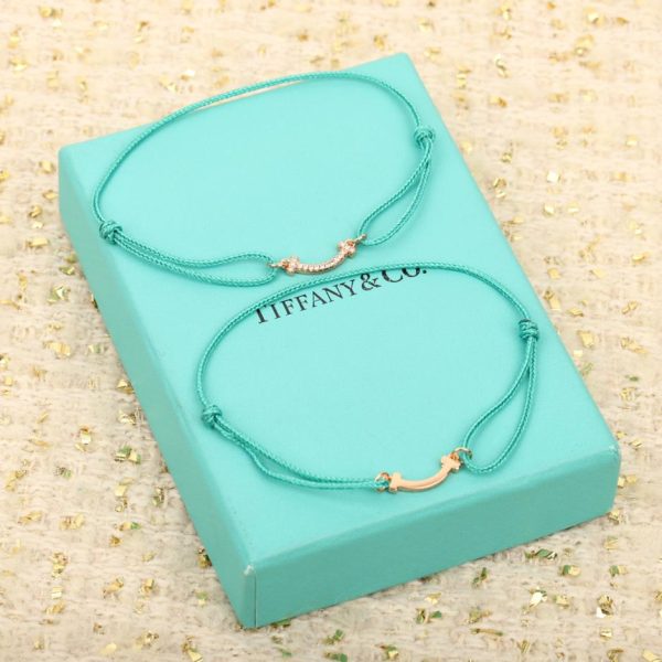 replica,repliche,fake,1:1,earrings,bracelet,ring,jewelry Collezione Tiffany T. Sorriso