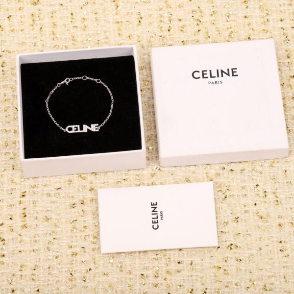 replica,repliche,fake,1:1,earrings,bracelet,ring,jewelry Collana con bracciale con logo Celine interamente in diamanti