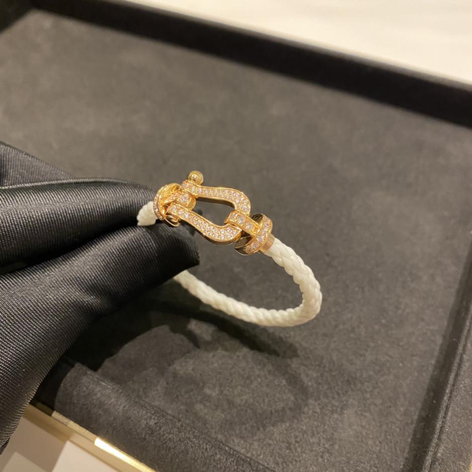 replica,repliche,fake,1:1,earrings,bracelet,ring,jewelry Bracciale Fred bianco con diamanti grandi