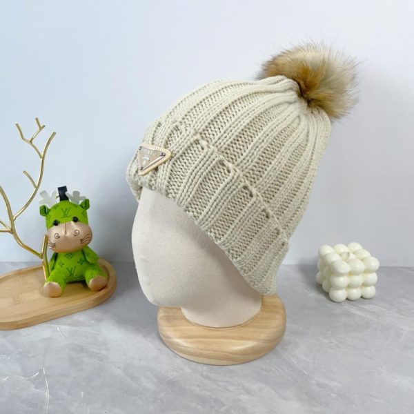 replica,repliche,fake,1:1,earrings,bracelet,ring,jewelry Ultimo cappello lavorato a maglia di lana di Prada