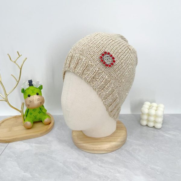 replica,repliche,fake,1:1,earrings,bracelet,ring,jewelry Cappello GUCCI in maglia con logo ricamato in paillettes