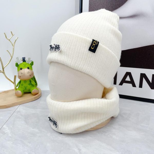 Set tre pezzi con sciarpa, cappello e guanti coach