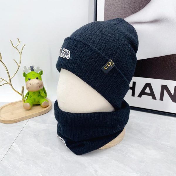 Set tre pezzi con sciarpa, cappello e guanti coach