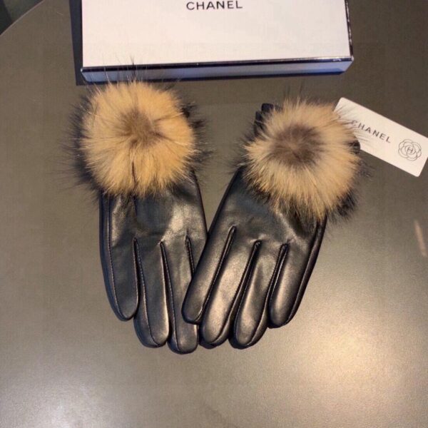replica,repliche,fake,1:1,earrings,bracelet,ring,jewelry Guanti Chanel autunno e inverno con palloni in pelliccia di volpe grande