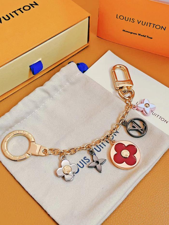 replica,repliche,fake,1:1,earrings,bracelet,ring,jewelry Louis Vuitton M80241 Ornamento per borsa a catena con fiori flash replica,repliche,fake,1:1,earrings,bracelet,ring,jewelry Louis Vuitton M80241 Ornamento per borsa a catena con fiori flash