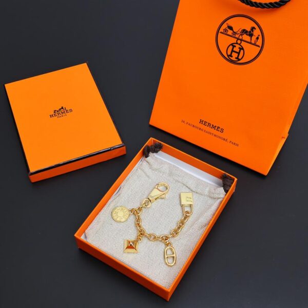 replica,repliche,fake,1:1,earrings,bracelet,ring,jewelry Ciondolo da borsa pegase HERMES Rodeo (D2B4)