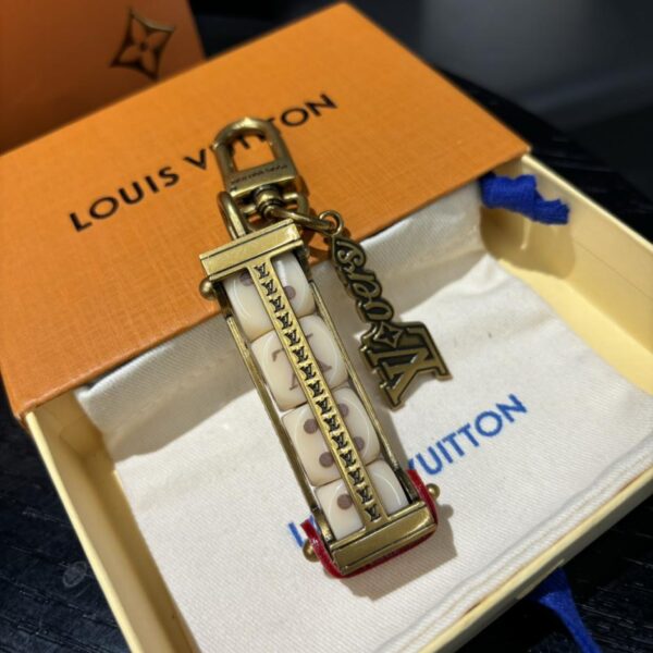 replica,repliche,fake,1:1,earrings,bracelet,ring,jewelry Accessori borsa LV LOVERS DICE e portachiavi M01750
