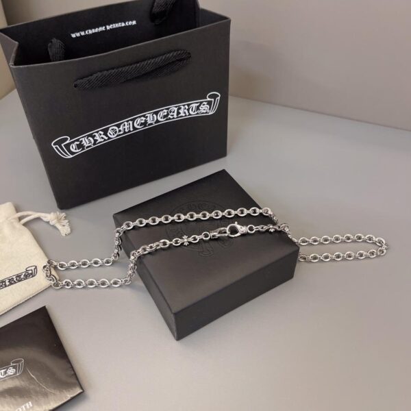replica,repliche,fake,1:1,earrings,bracelet,ring,jewelry Collana con cuore di corvo (E59C)