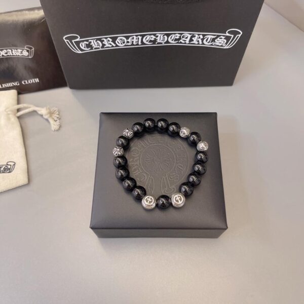 replica,repliche,fake,1:1,earrings,bracelet,ring,jewelry Bracciale naturale cuore di corvo (8A4A)