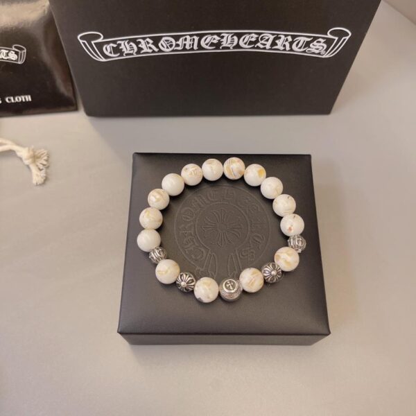 replica,repliche,fake,1:1,earrings,bracelet,ring,jewelry Bracciale naturale cuore di corvo (D267)