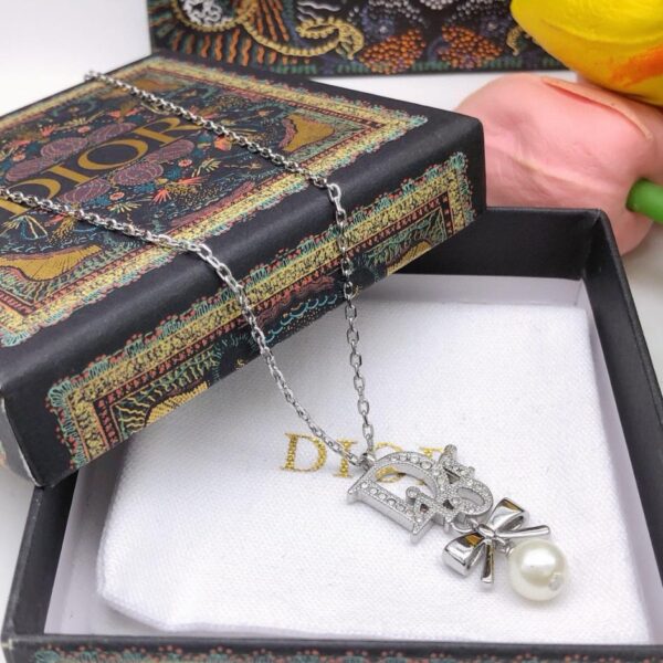 replica,repliche,fake,1:1,earrings,bracelet,ring,jewelry L’ultima collana con fiocco di Dior (4268)
