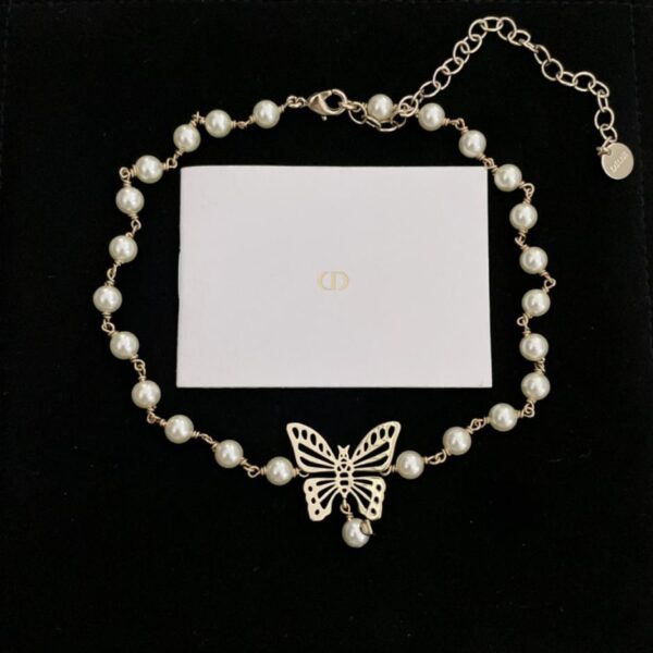 replica,repliche,fake,1:1,earrings,bracelet,ring,jewelry Girocollo con perle a farfalla cava Dior (D5E1)