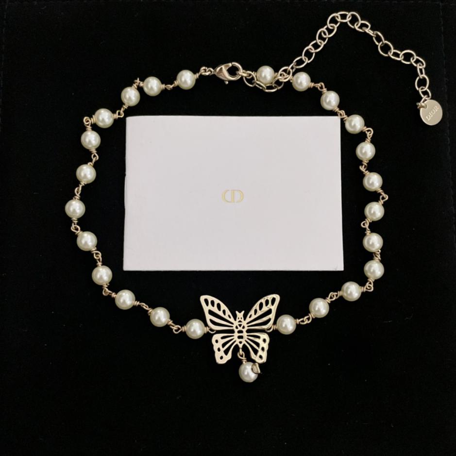 replica,repliche,fake,1:1,earrings,bracelet,ring,jewelry Girocollo con perle a farfalla cava Dior (D5E1) replica,repliche,fake,1:1,earrings,bracelet,ring,jewelry Girocollo con perle a farfalla cava Dior (D5E1)