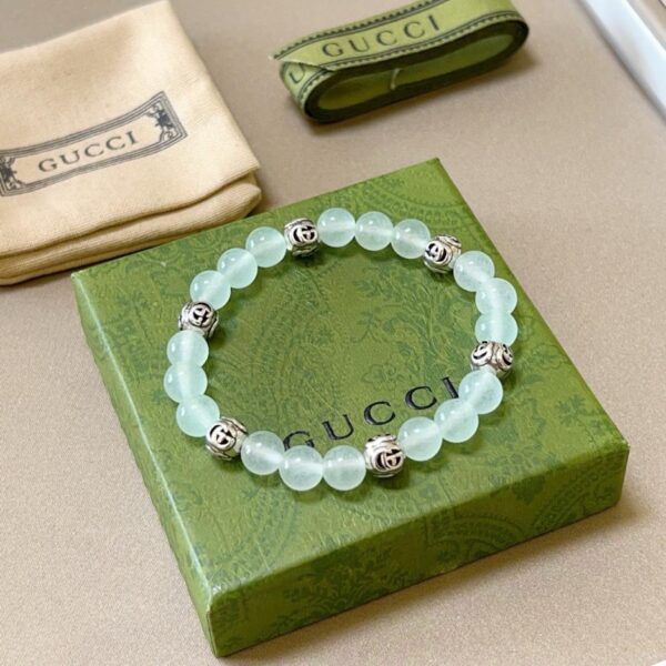 replica,repliche,fake,1:1,earrings,bracelet,ring,jewelry Bracciali Gucci per uomo e donna, ultimo braccialetto in pietra di cristallo (60C6)