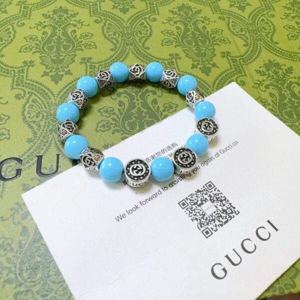 replica,repliche,fake,1:1,earrings,bracelet,ring,jewelry Braccialetti Gucci per uomo e donna, l’ultimo braccialetto in pietra naturale con zaffiro serie retrò (77A6)