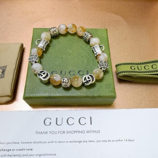 replica,repliche,fake,1:1,earrings,bracelet,ring,jewelry Bracciali Gucci per uomo e donna, l’ultimo braccialetto in cristallo naturale (9BC0)