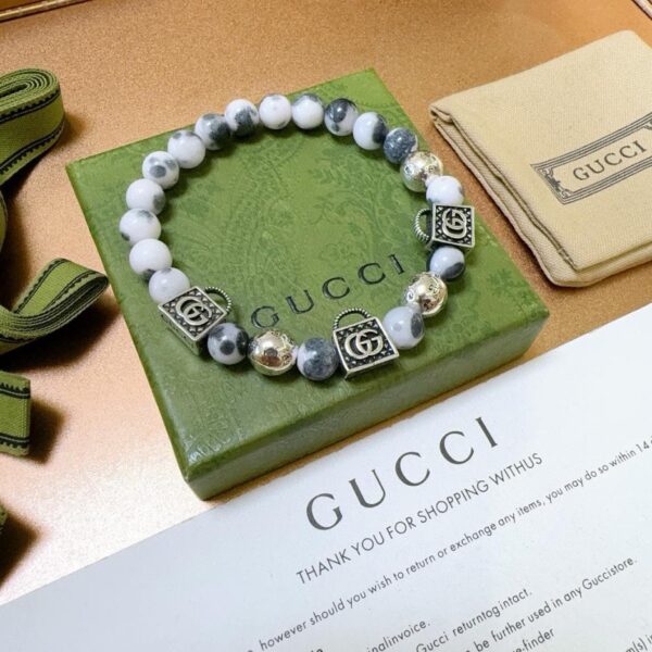 replica,repliche,fake,1:1,earrings,bracelet,ring,jewelry Bracciali Gucci per uomo e donna, ultimo braccialetto in pietra naturale (29FD)