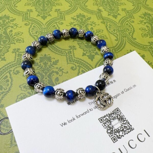 replica,repliche,fake,1:1,earrings,bracelet,ring,jewelry Bracciali Gucci per uomo e donna, ultimo braccialetto con occhio di tigre blu naturale (9323)