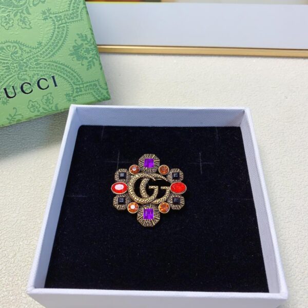 Spilla vintage Gucci con diamanti colorati (E497)