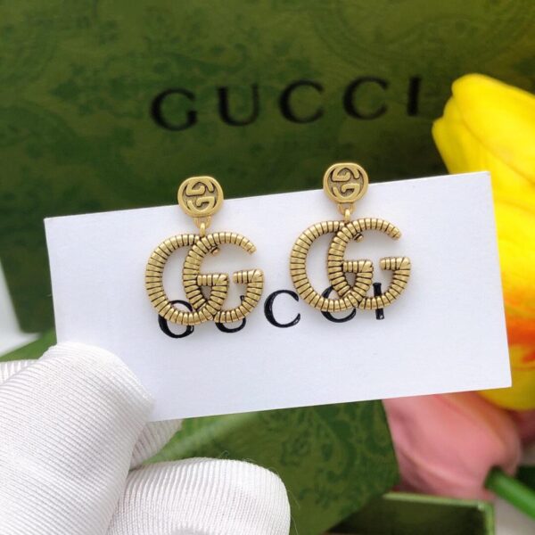 replica,repliche,fake,1:1,earrings,bracelet,ring,jewelry Gucci orecchini intrecciati doppia G new twist (0946)