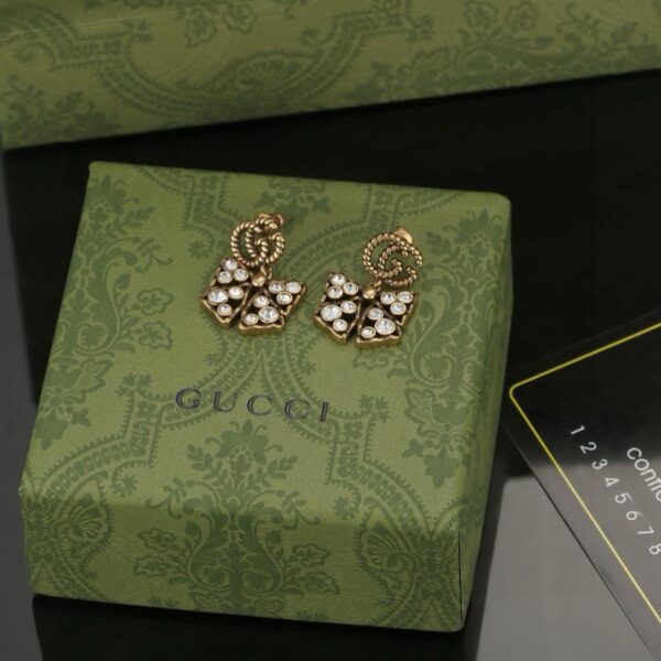replica,repliche,fake,1:1,earrings,bracelet,ring,jewelry Orecchini Gucci Doppia G con fiocco (F553)