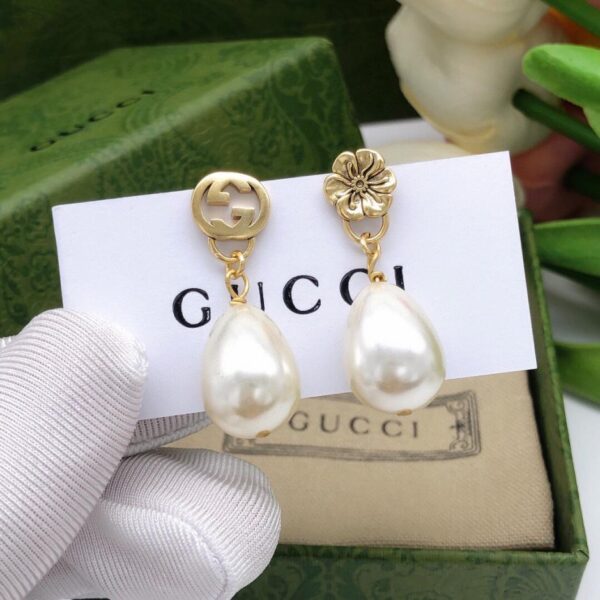 replica,repliche,fake,1:1,earrings,bracelet,ring,jewelry Gucci nuovi orecchini gocciolanti a forma di fiore doppia G (F6F4)