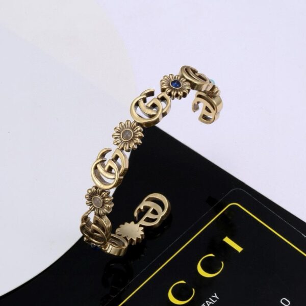 Bracciale Gucci con logo classico senza tempo (7BD3)